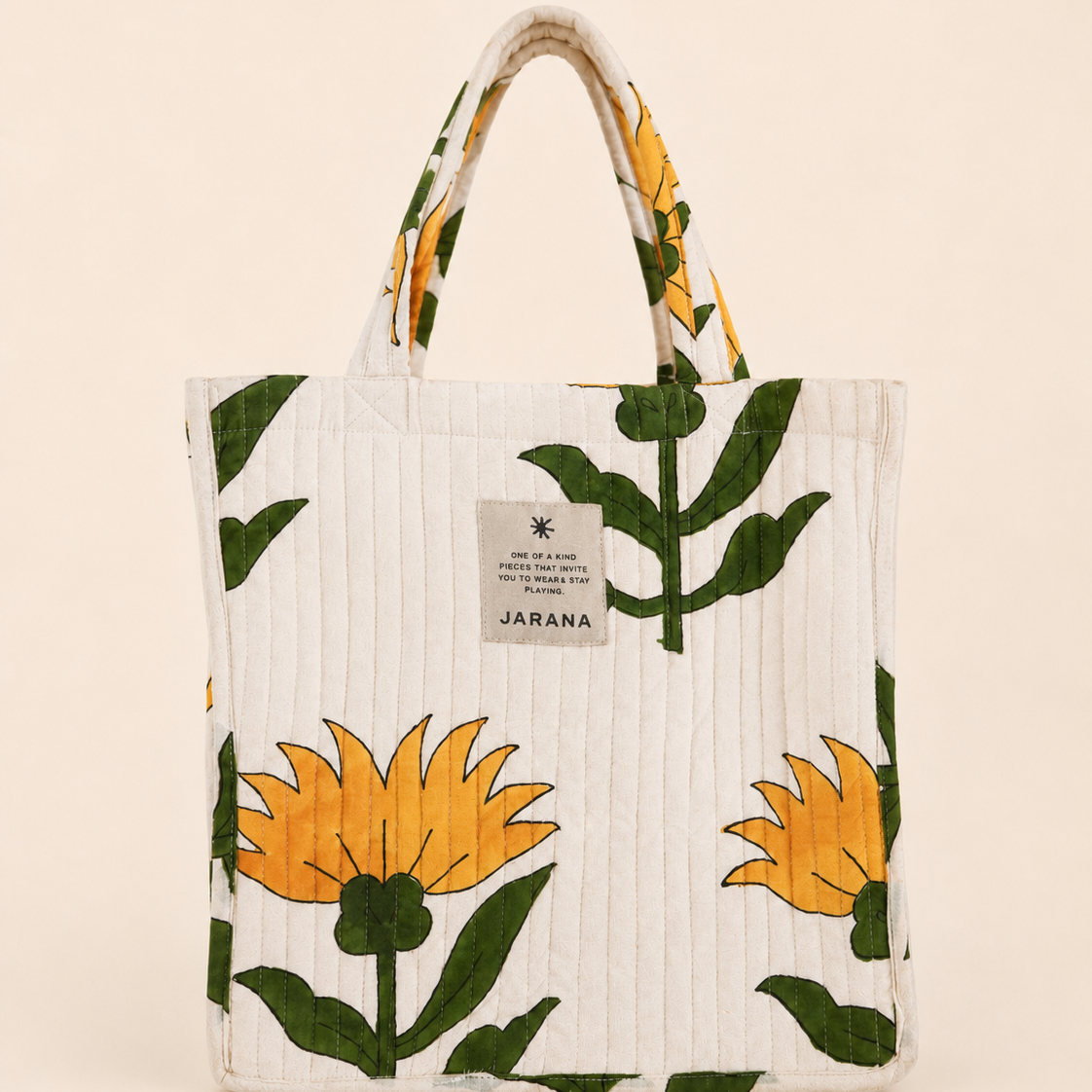 Block-printed cotton tote bag with padded quilting and practical daily shape