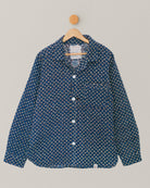 Front view of traditional blue Kantha shirt with floral block print, hanging on wooden hanger