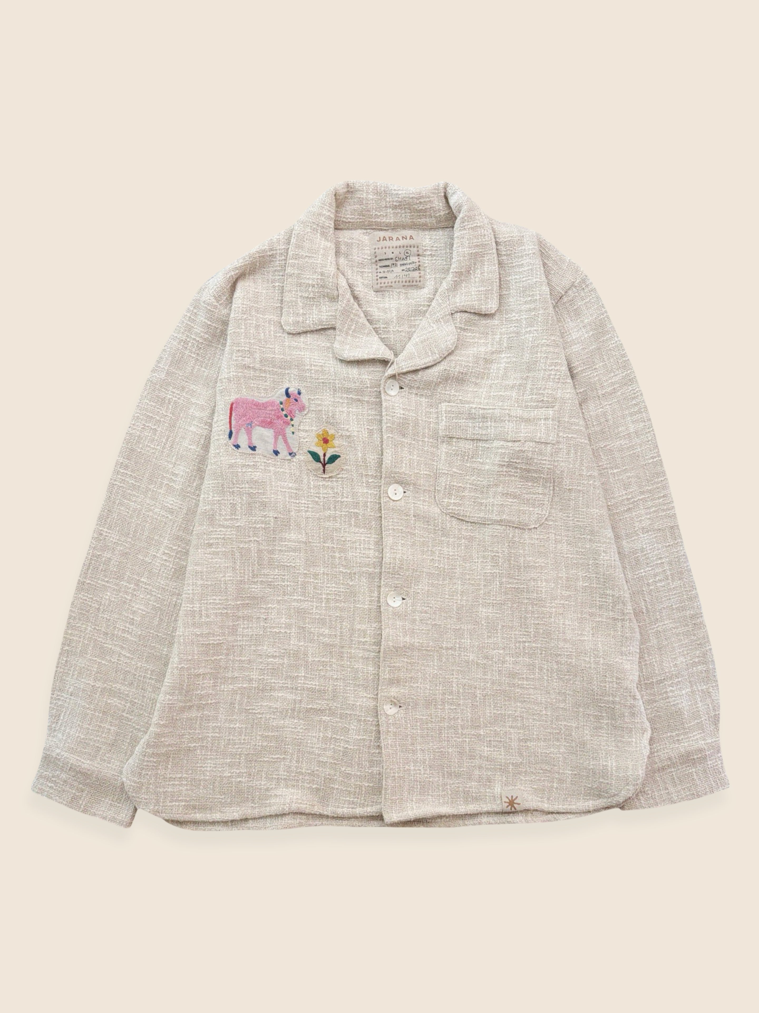 One-of-one Kutch patchwork overshirt with shell buttons and vintage cow embroidery