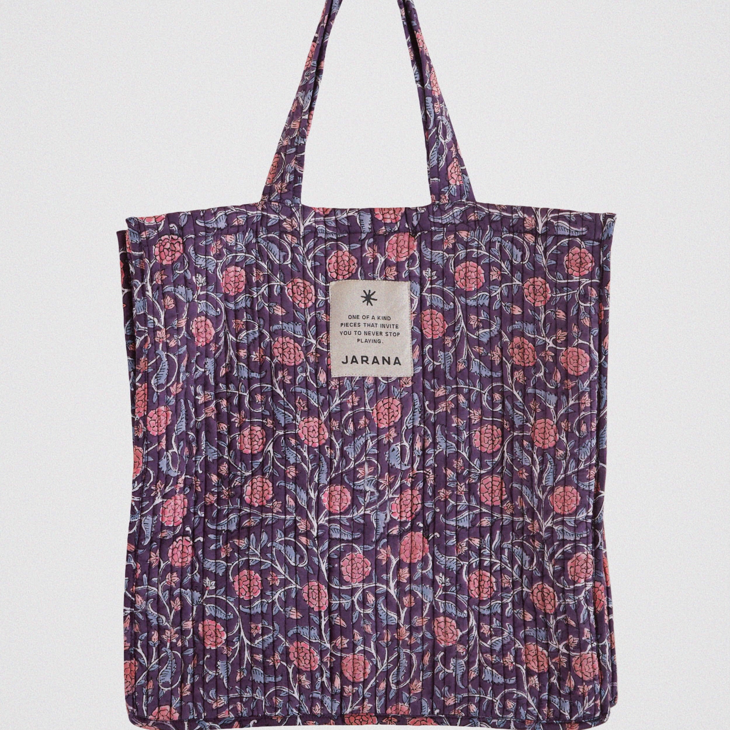 Rich purple quilted tote bag with pink block-printed florals, made from leftover cotton textiles by Jarana.