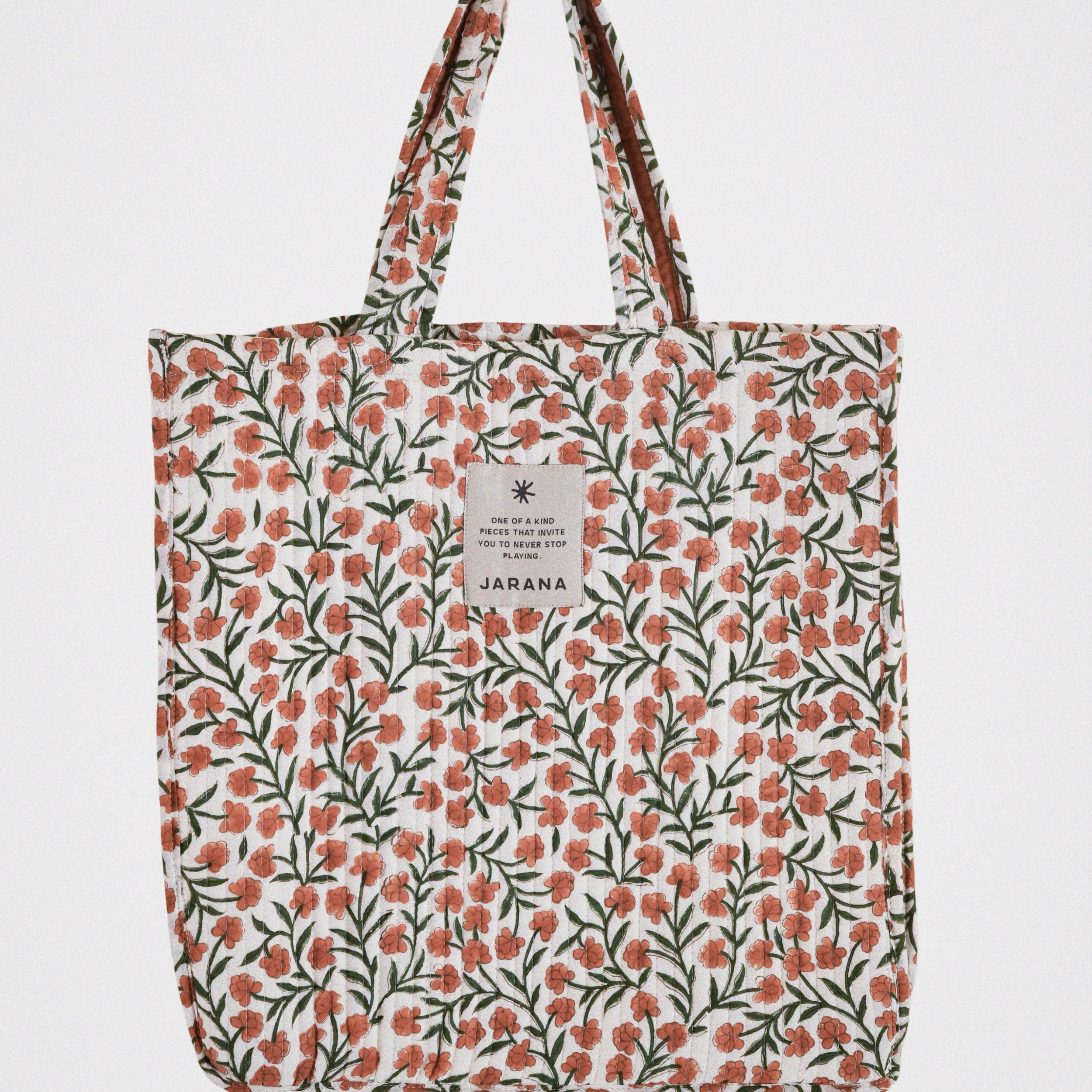 Quilted cotton tote bag with delicate orange floral block print, handmade from leftover fabric by Jarana.