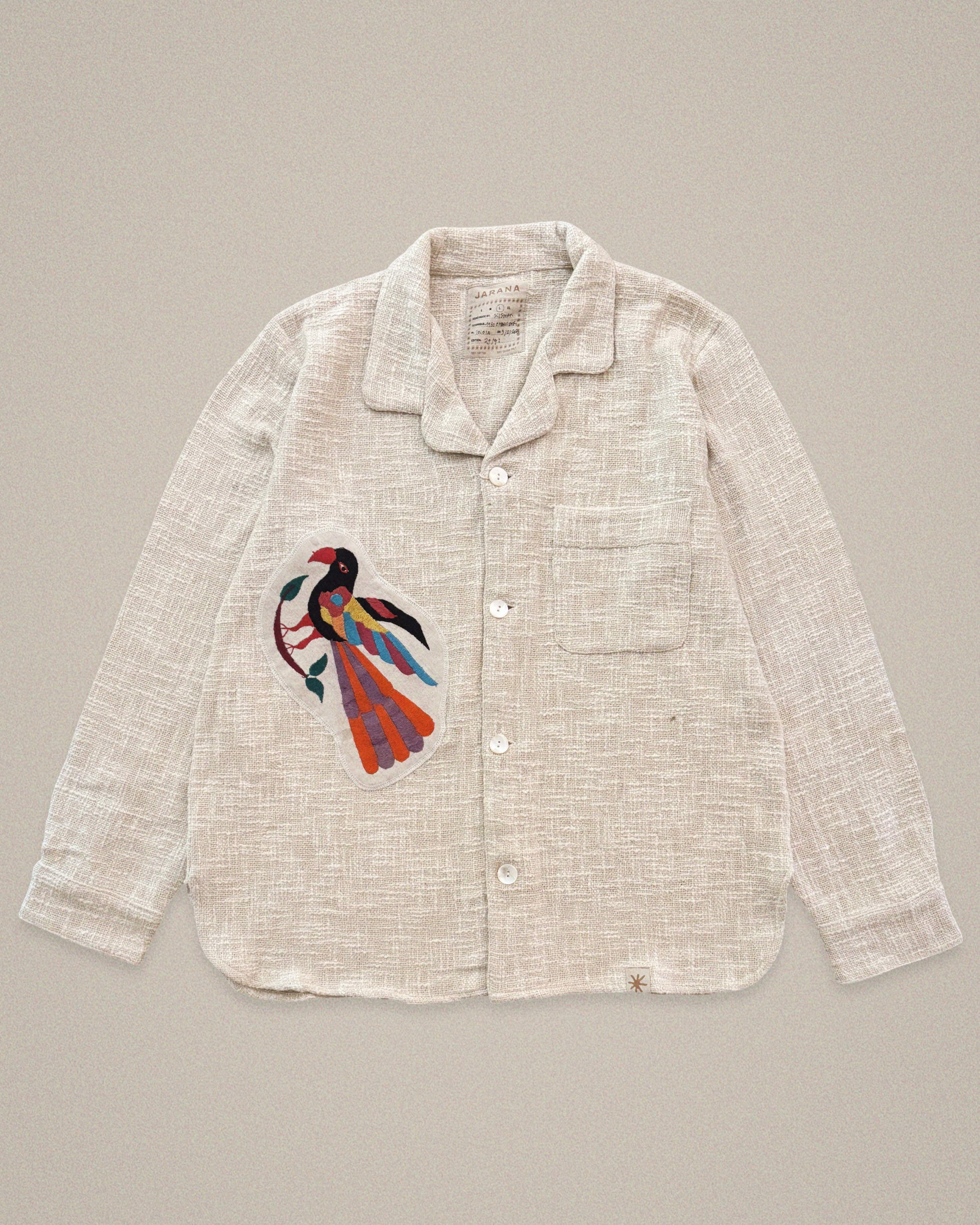 Handmade linen shirt with large colorful bird embroidery β vintage textile design by Jarana