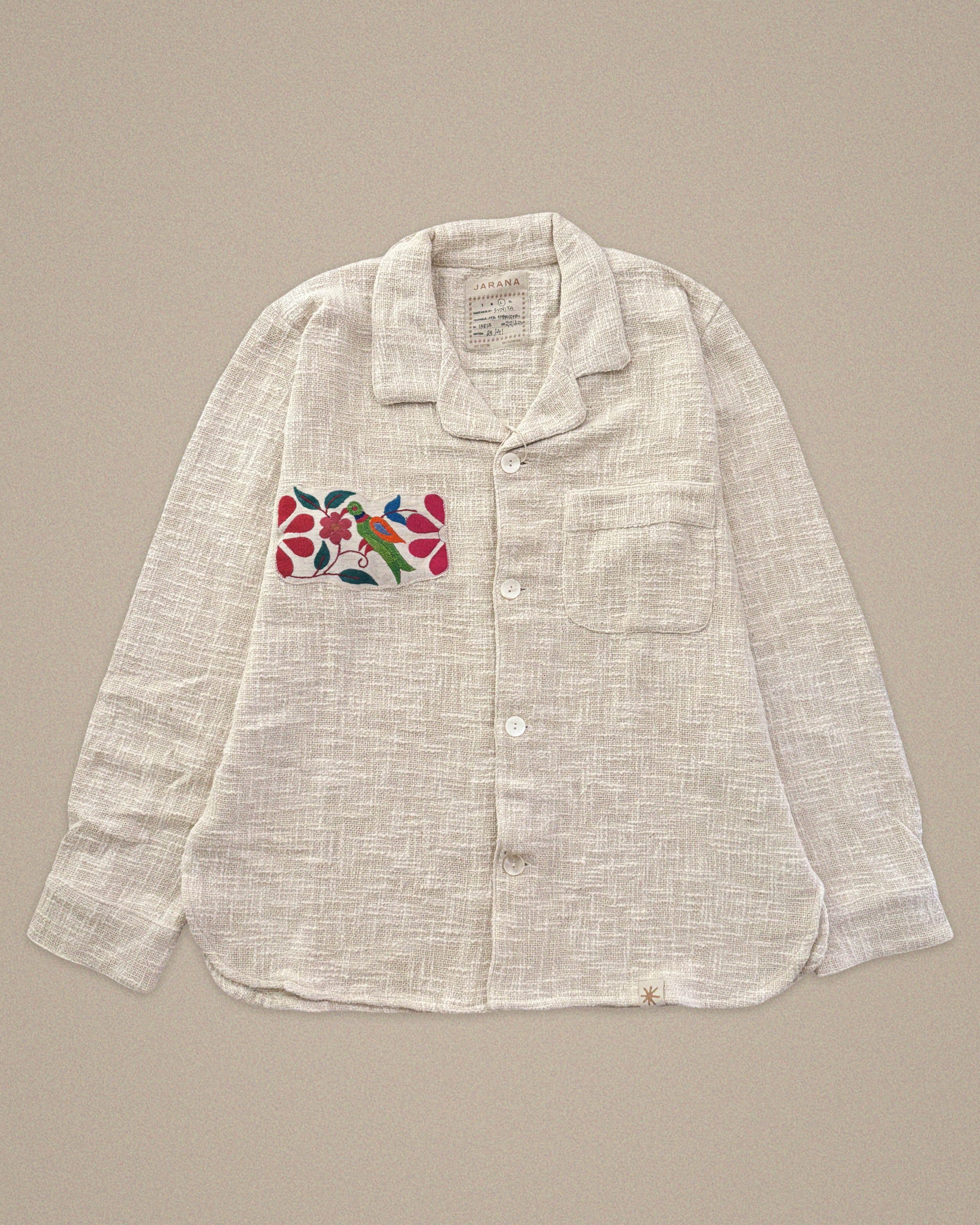 Handmade natural cotton shirt with parrot and floral embroidery β vibrant Jarana design