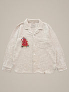 Handmade cotton shirt with red Ganesha embroidery β spiritual Indian textile art by Jarana