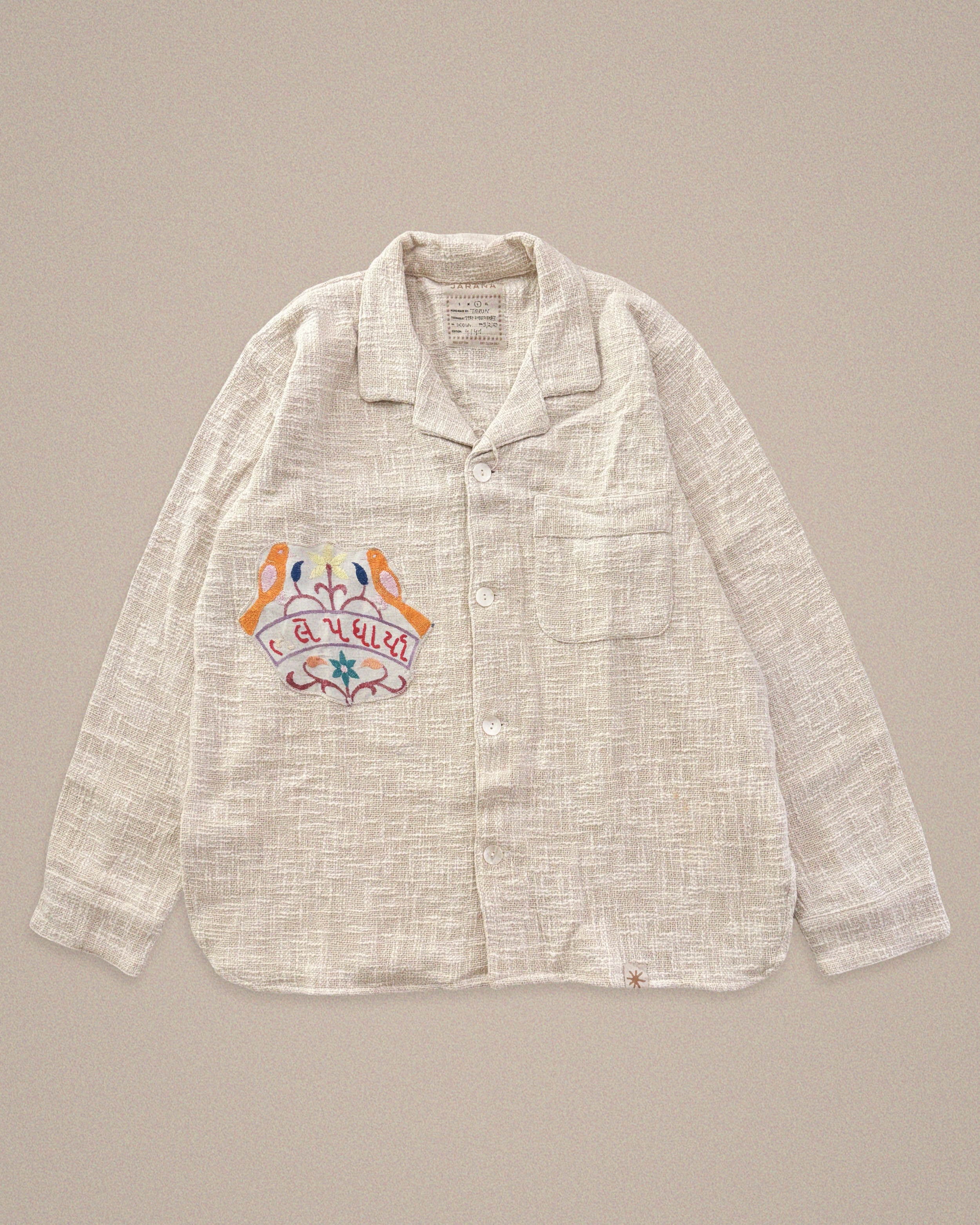 Handmade cotton shirt with Gujarati script and bird embroidery β cultural statement by Jarana