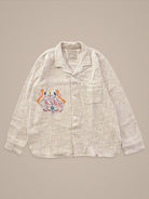 Handmade cotton shirt with Gujarati script and bird embroidery β cultural statement by Jarana