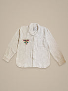Handmade linen shirt with colorful lotus embroidery β minimal floral motif by Jarana