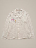 Handmade raw cotton shirt with pink cow and yellow flower embroidery β Jarana limited edition