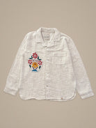 Handmade linen shirt with floral embroidery in red and yellow β limited edition by Jarana