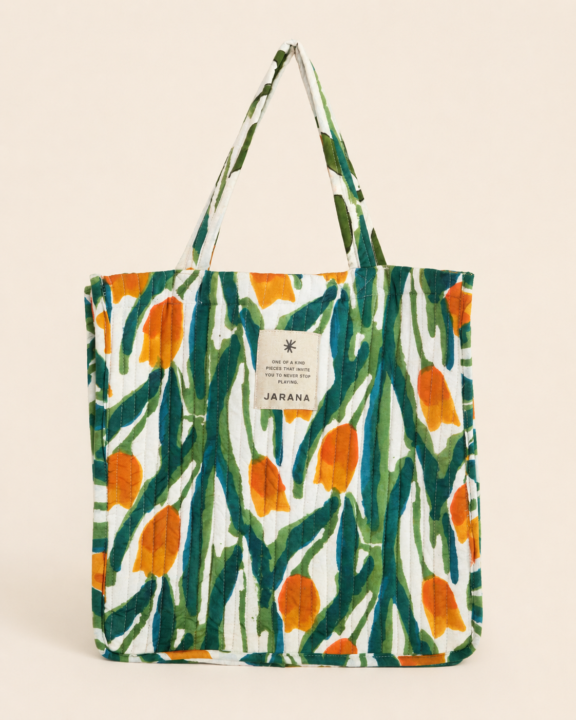 One-of-a-kind quilted tote bag in hand block-printed cotton with soft padded structure