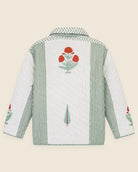 Back view of reversible quilted cotton jacket made in India with floral print