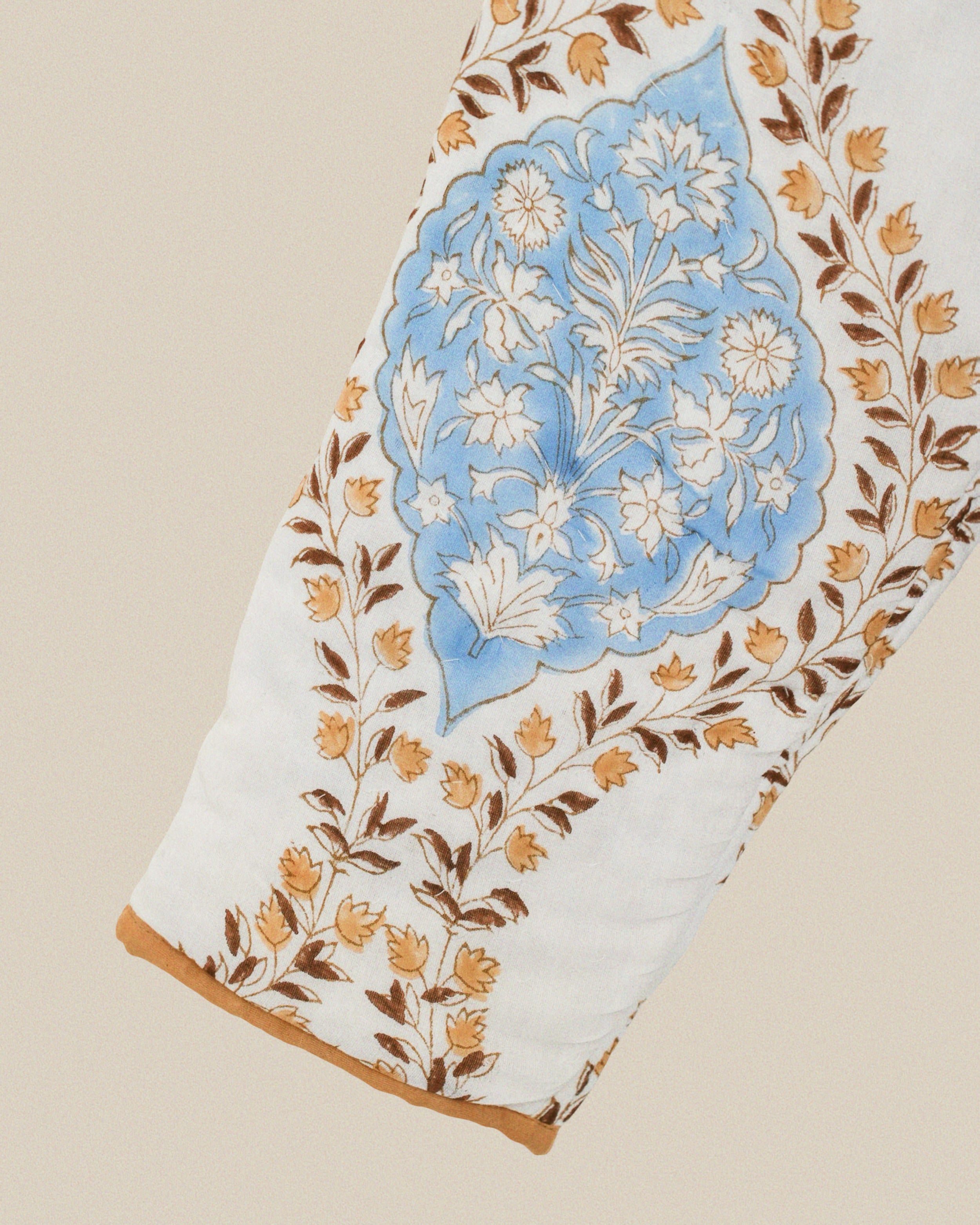 Decorative fabric with floral patterns on a beige background