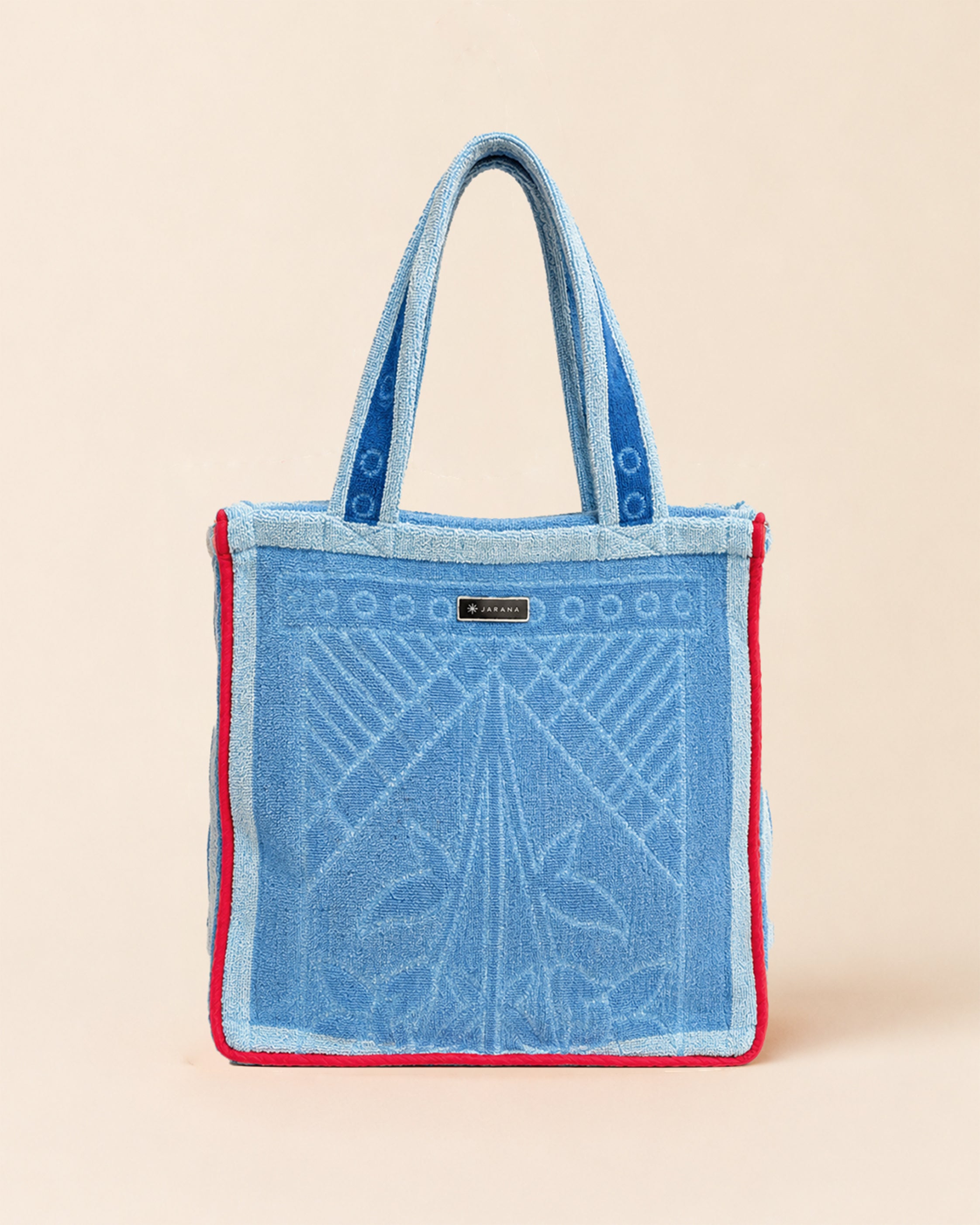 Blue tote bag made from upcycled local Sri Lankan towel, front view, with soft towel texture and Jarana label