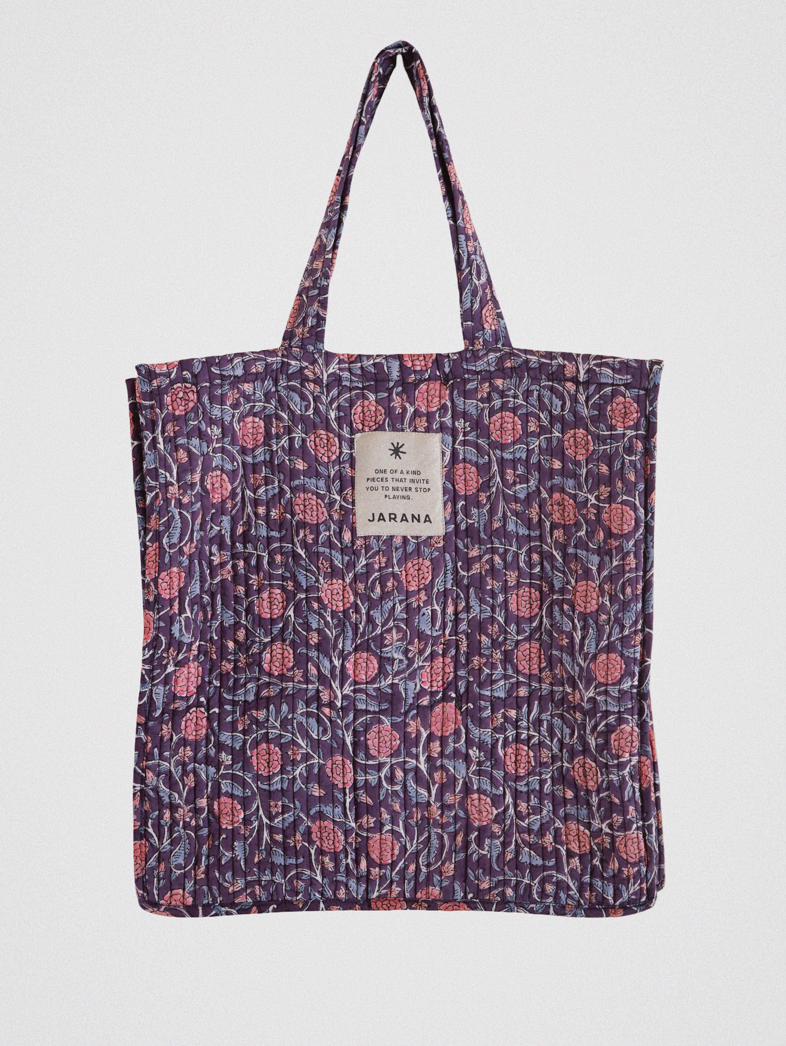 Rich purple quilted tote bag with pink block-printed florals, made from leftover cotton textiles by Jarana.