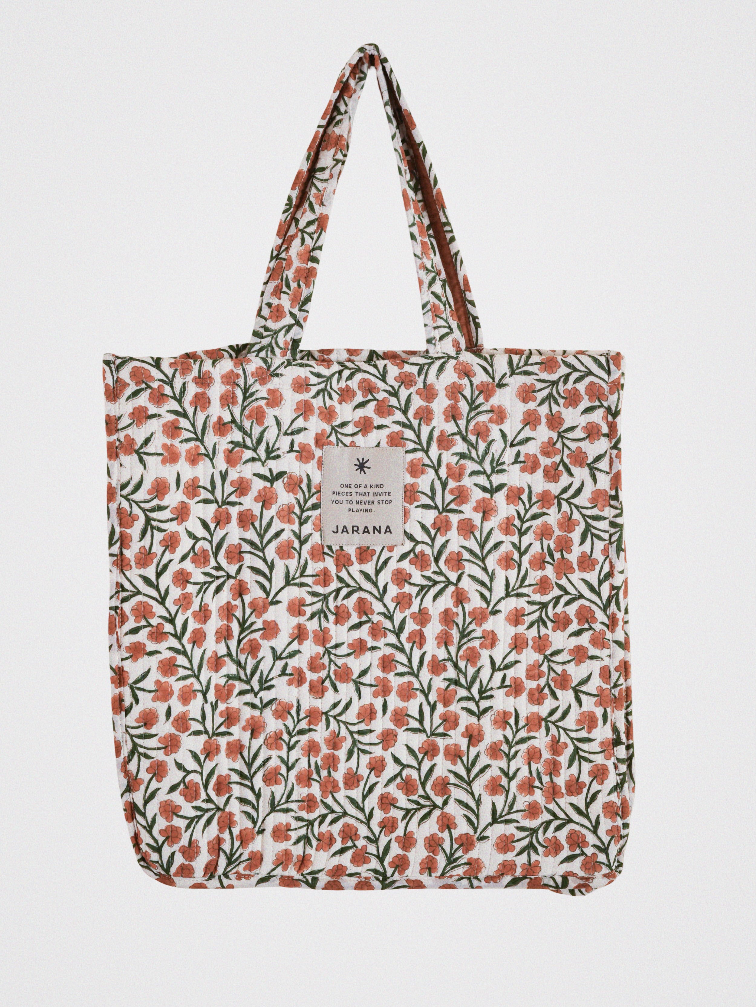 Quilted cotton tote bag with delicate orange floral block print, handmade from leftover fabric by Jarana.