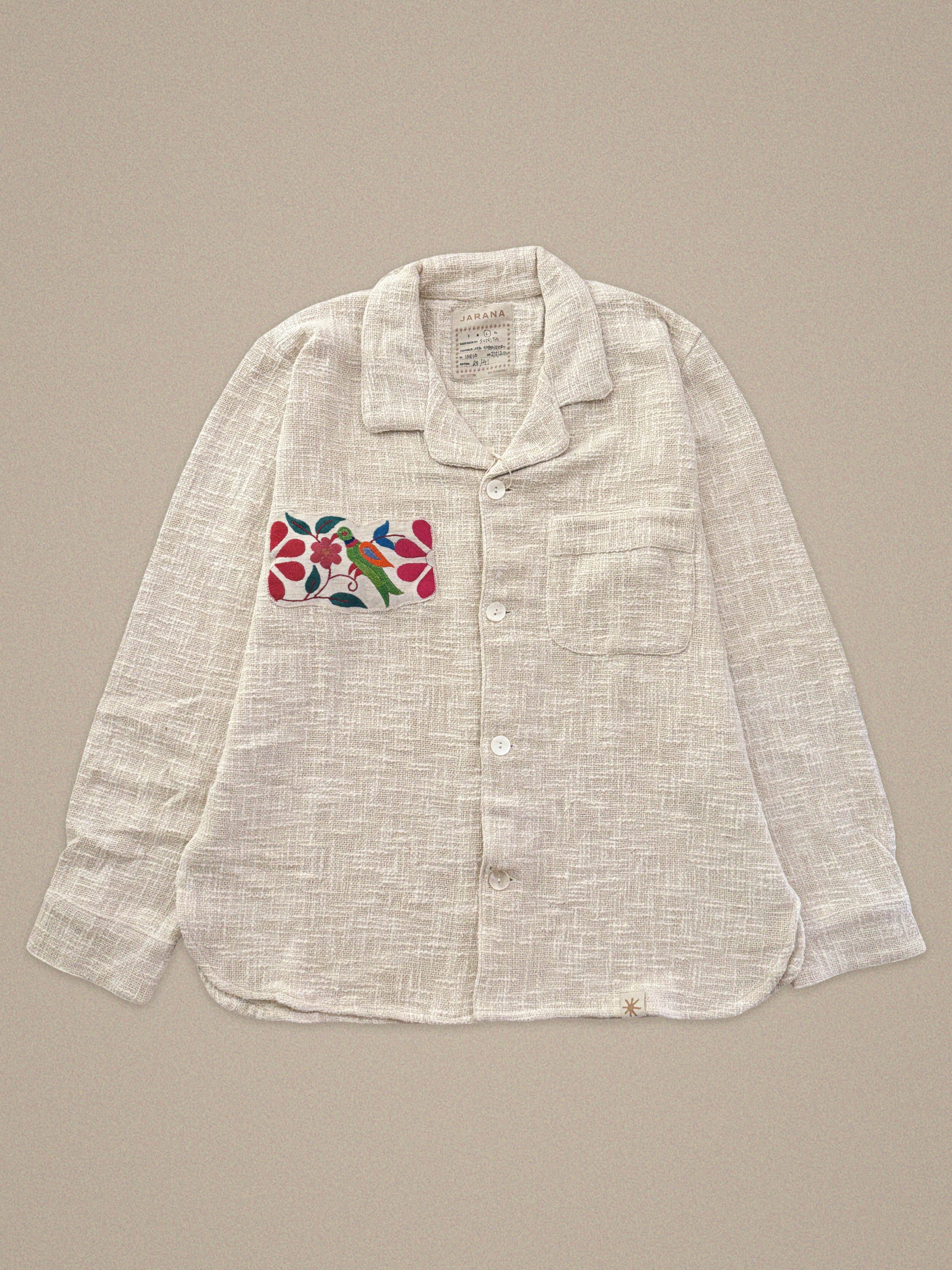 Handmade natural cotton shirt with parrot and floral embroidery – vibrant Jarana design