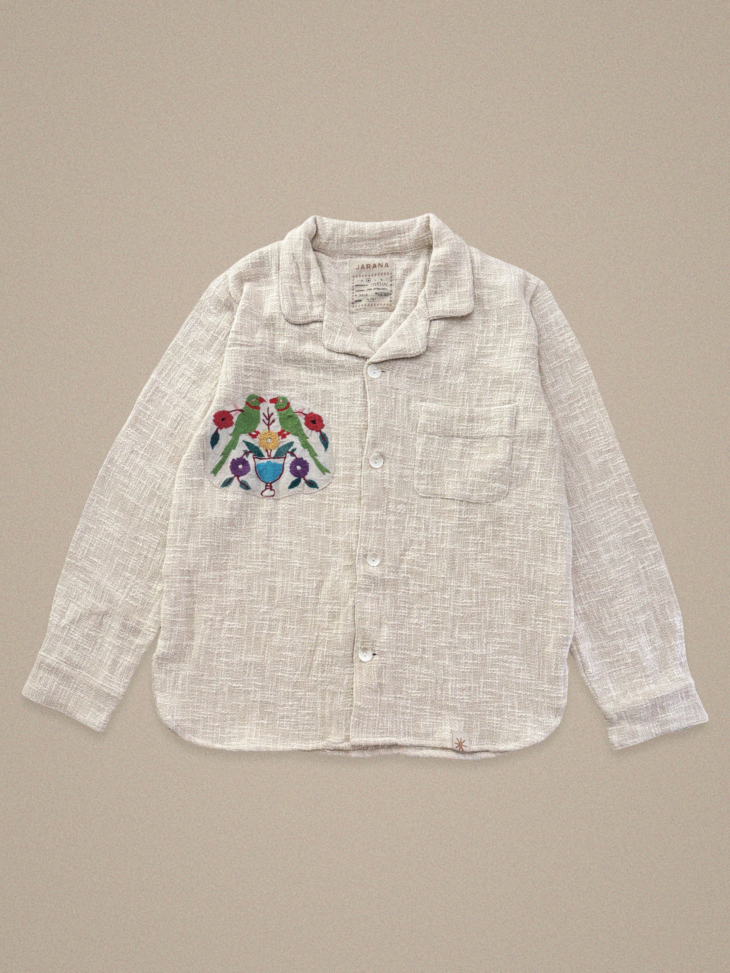 Handmade cotton shirt with embroidered floral and bird pattern – crafted by Jarana