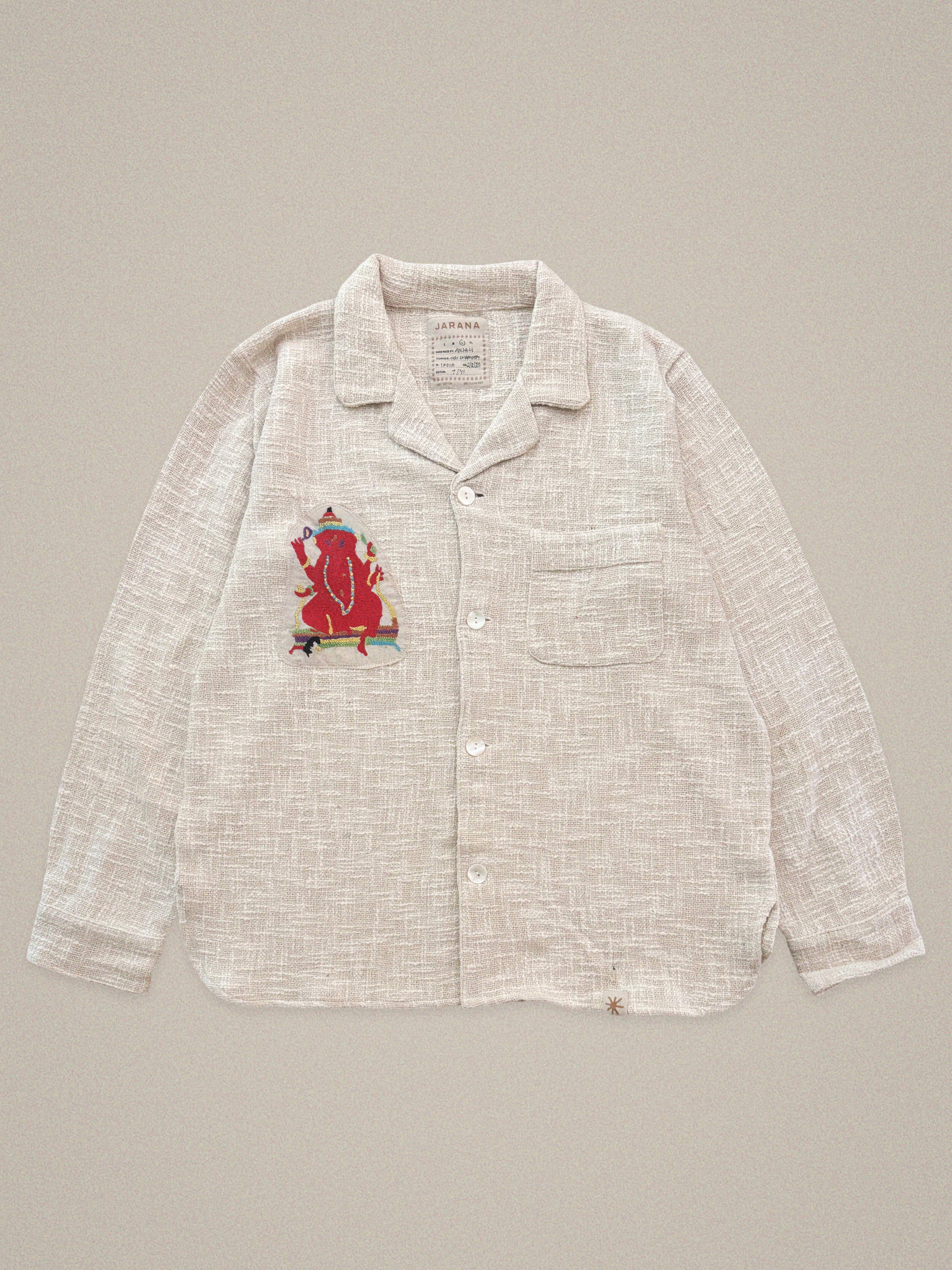 Handmade cotton shirt with red Ganesha embroidery – spiritual Indian textile art by Jarana