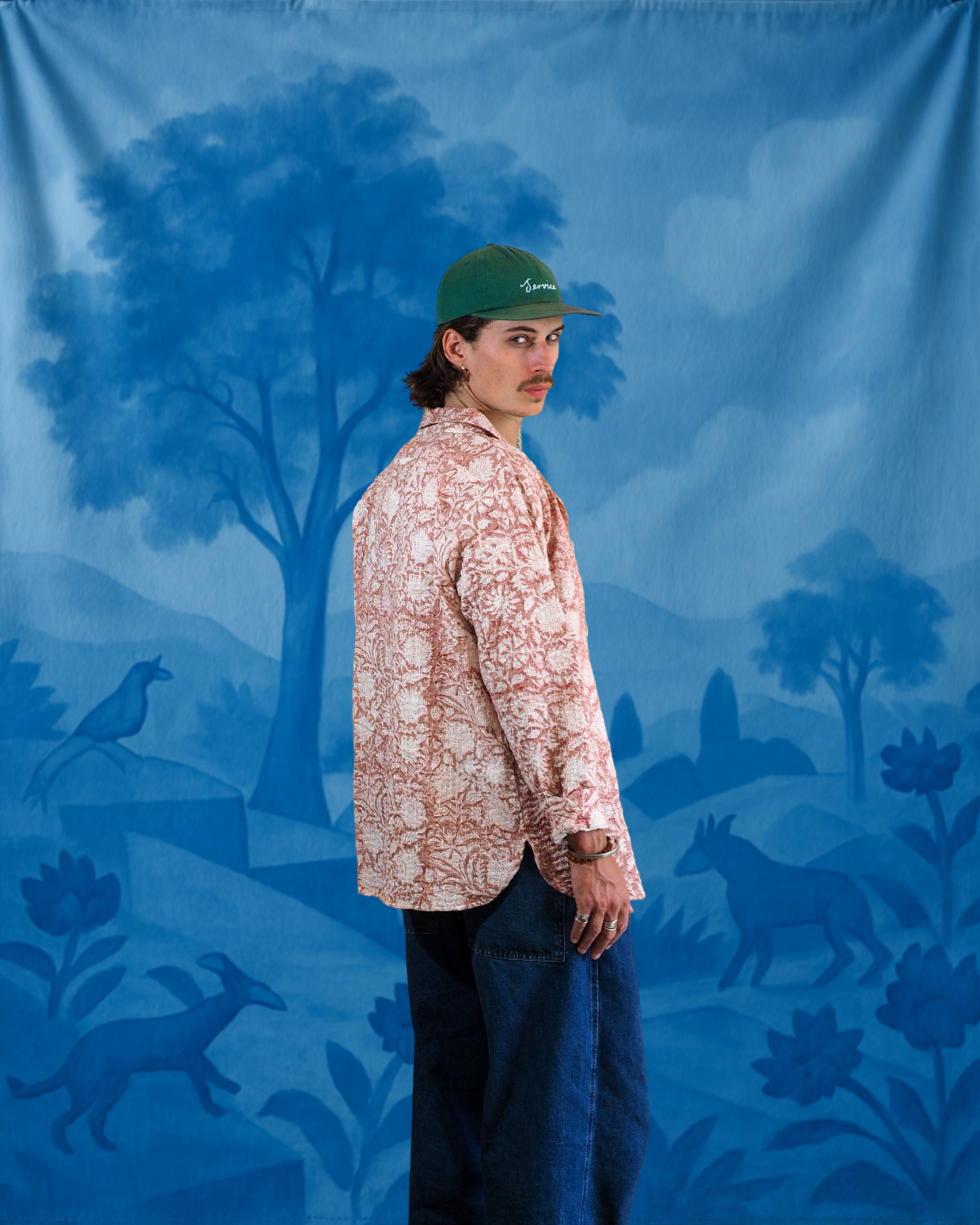 Back view of Kantha floral embroidered shirt worn by model, featuring traditional blockprint detailing