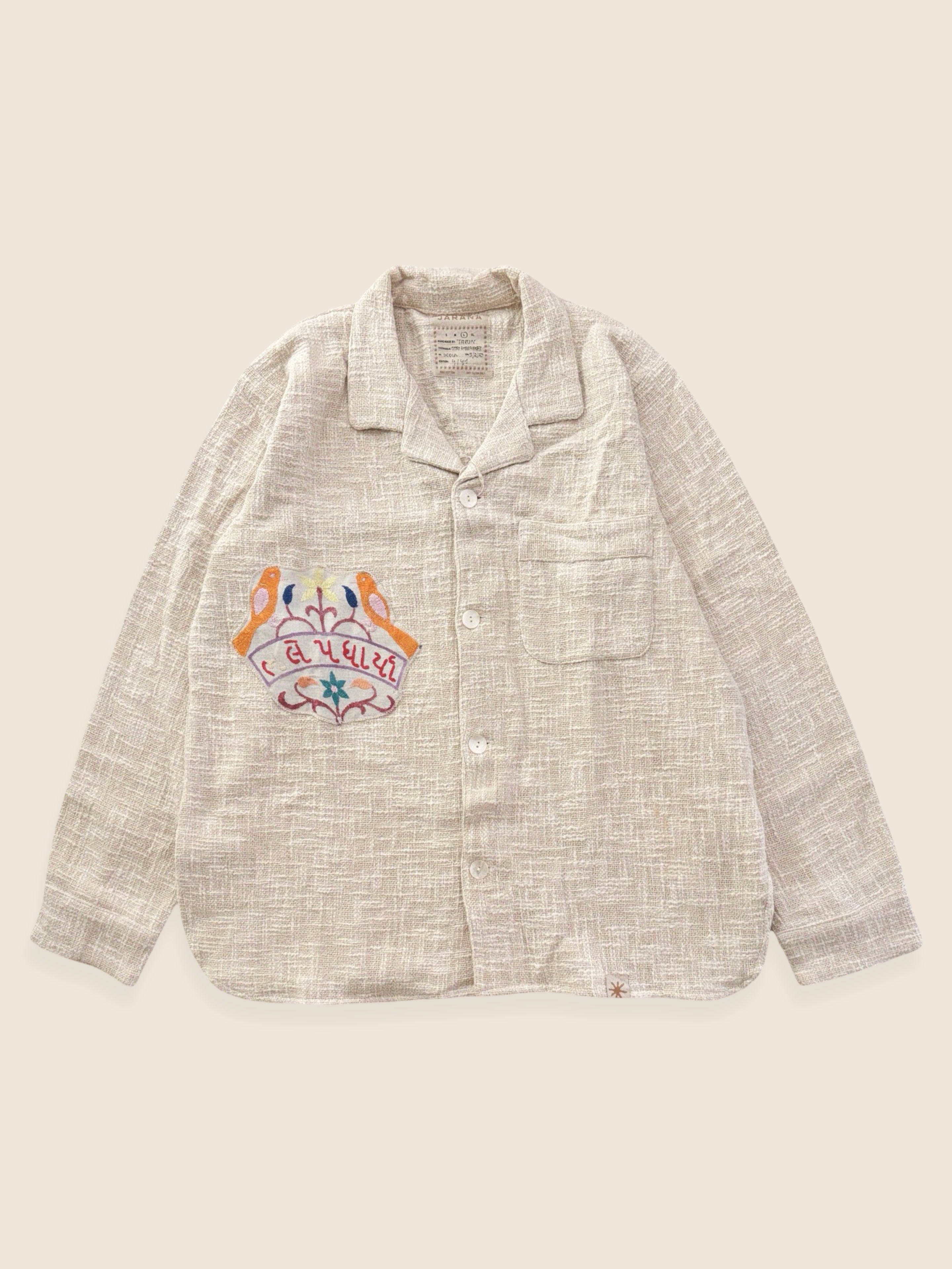 Jarana handloom cotton overshirt featuring antique Kutch embroidery from Gujarat